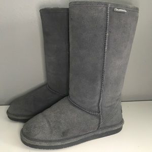 A tall grey size 8 pair of bear paws